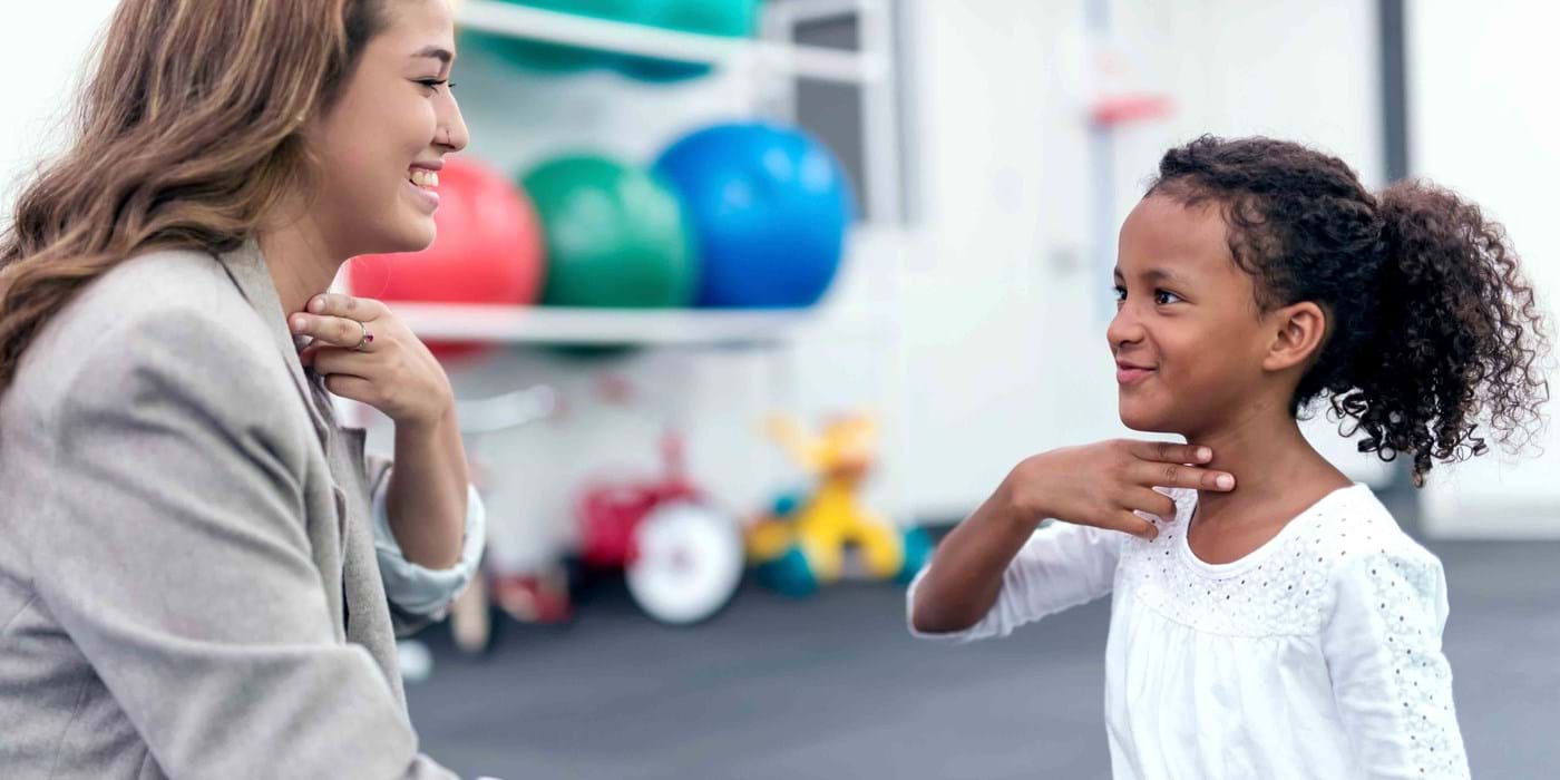 Therapist working with child