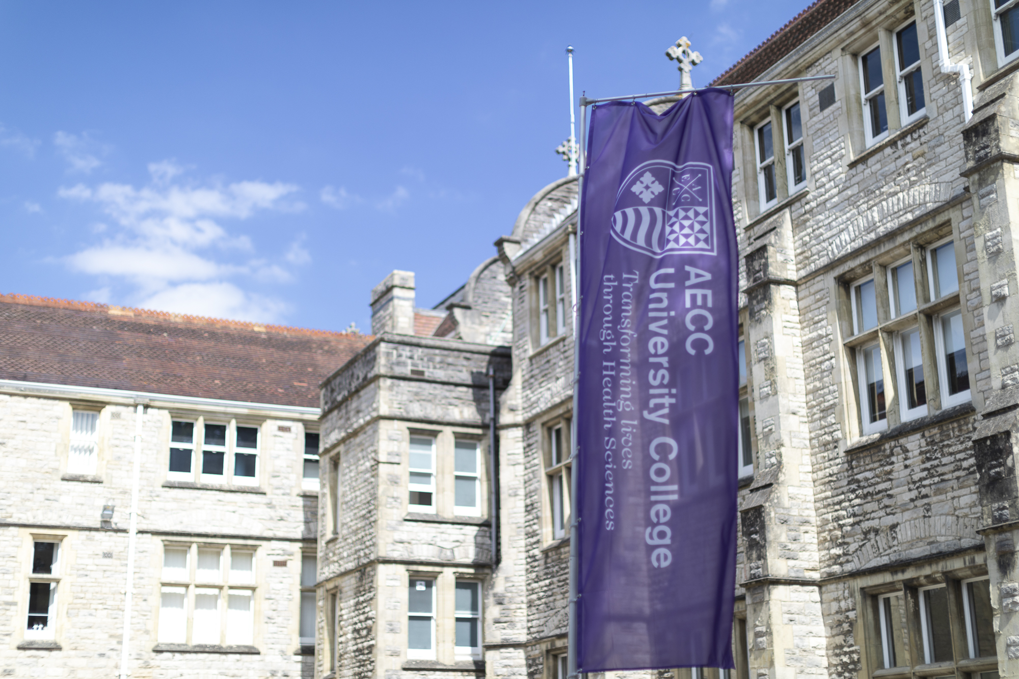 Front of AECC with flag.