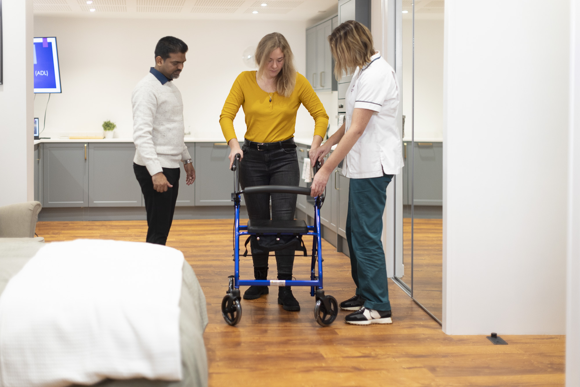 Occupational Therapy students in the ADL suite learning
