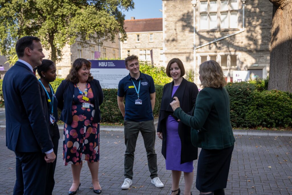 Bridget Phillipson on a campus tour.