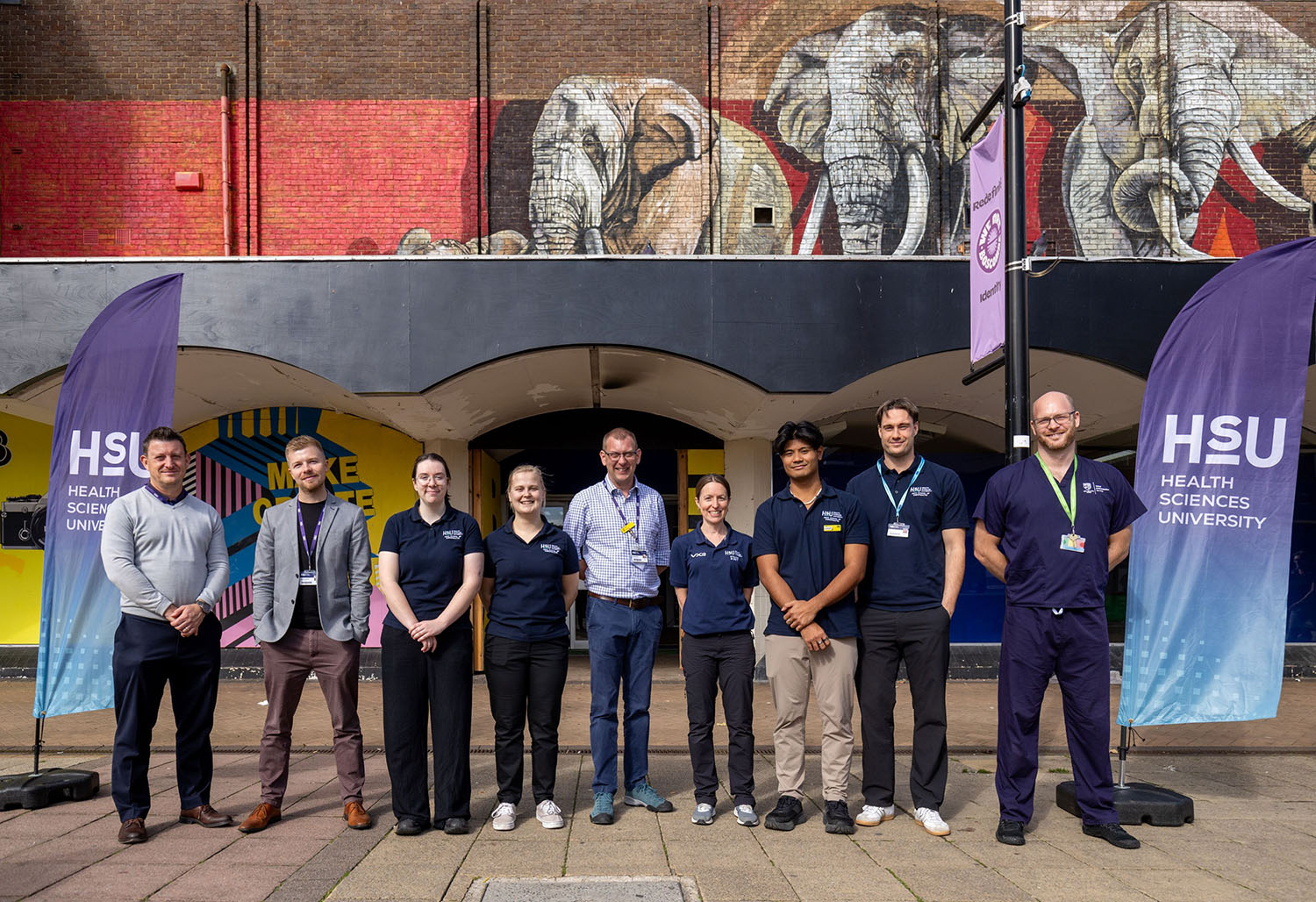 Some-of-the-Health-Sciences-University-students-and-staff-outside-the-health-and-support-pop-up-event