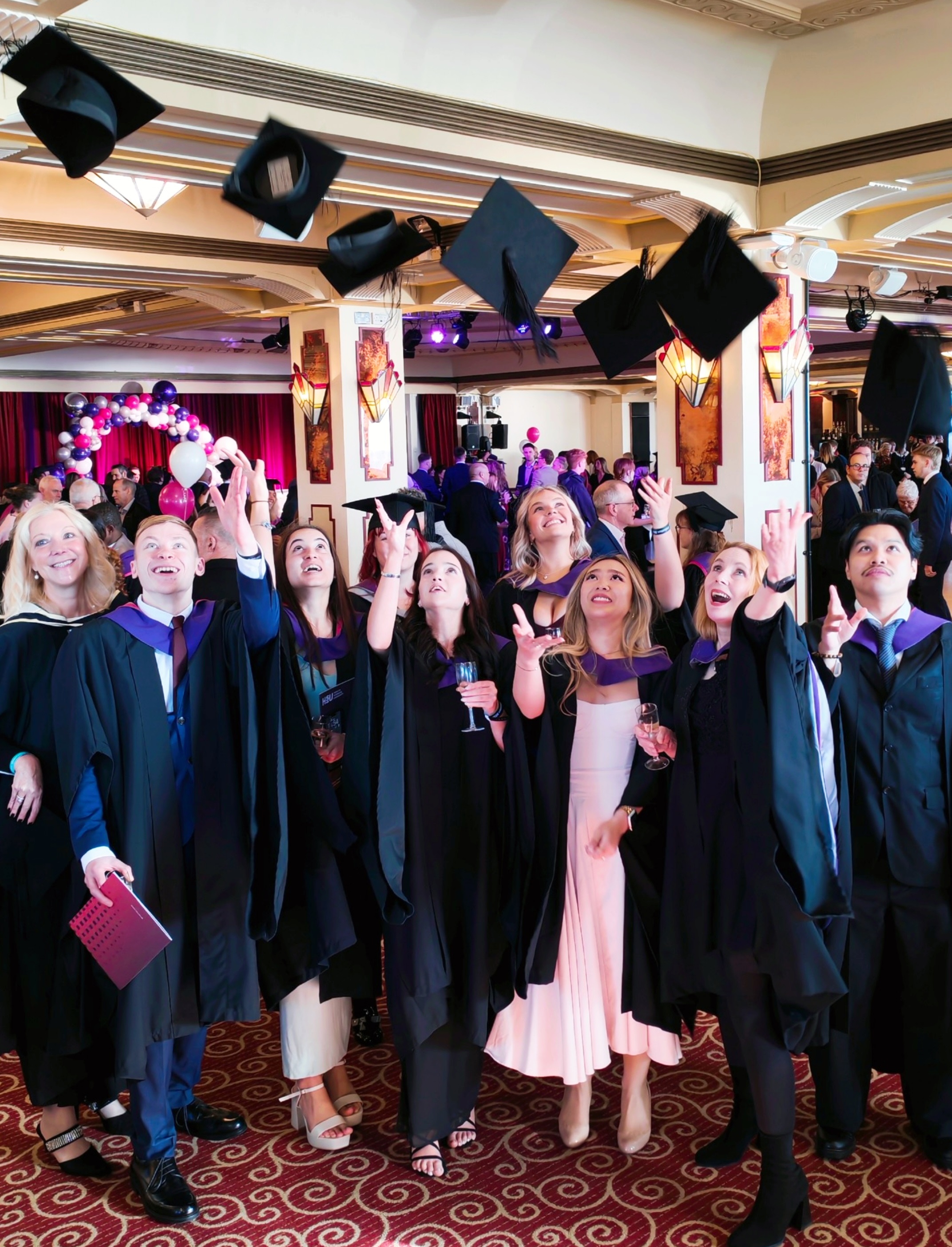 A group of students celebrating graduation