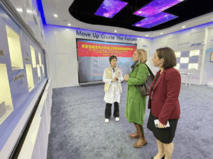 Three people talking and observing