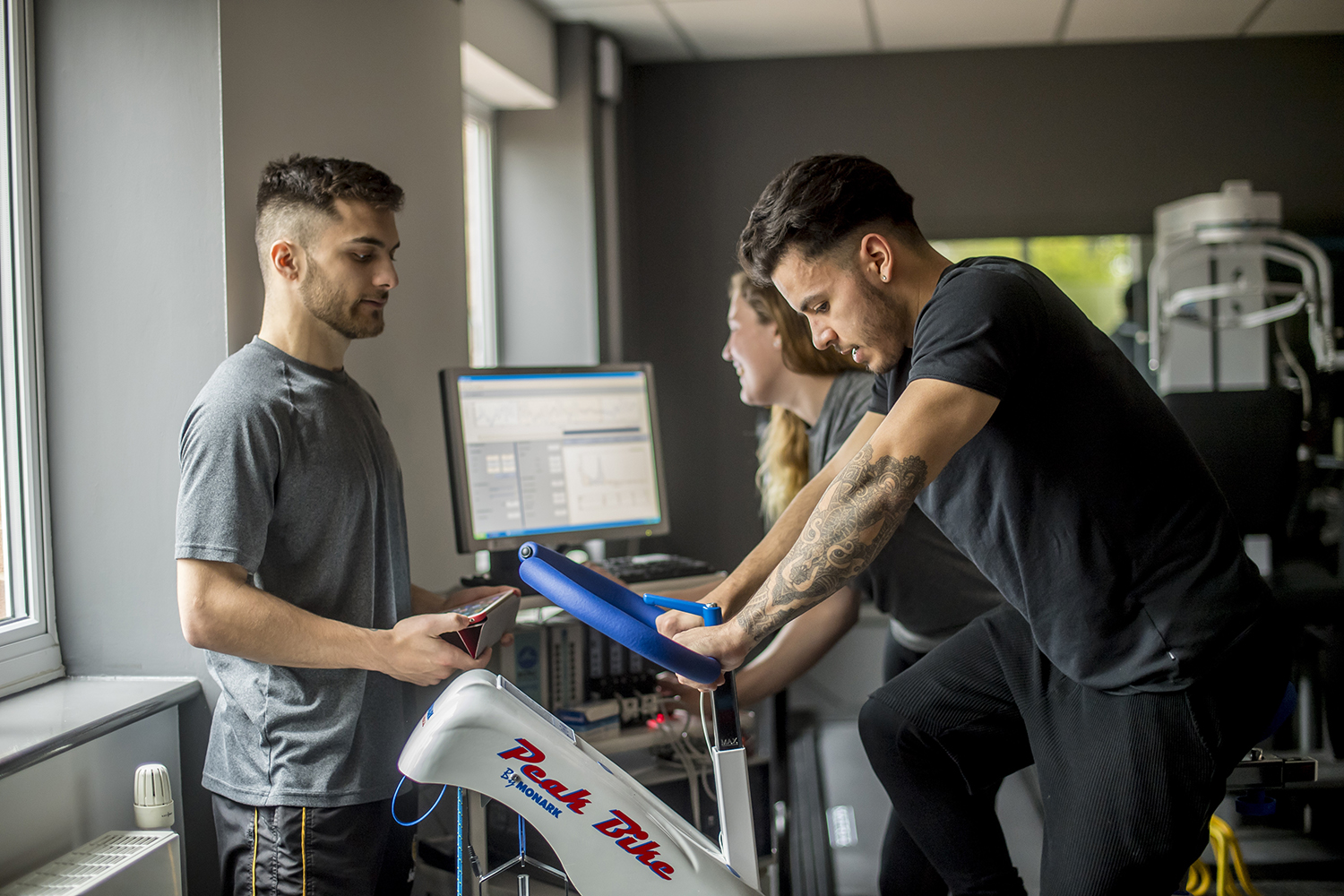 A person on a Exercise bike