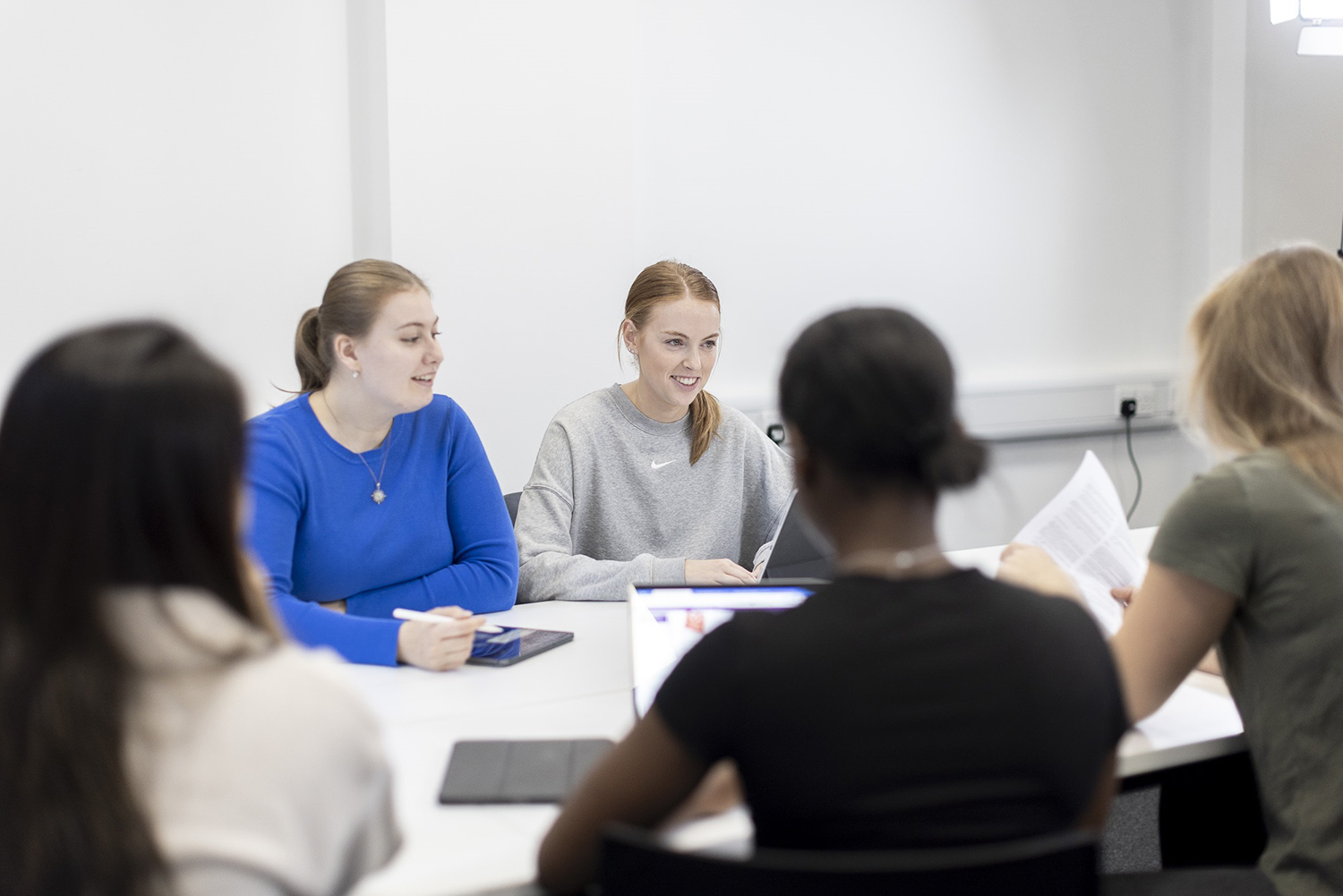 people working around a table