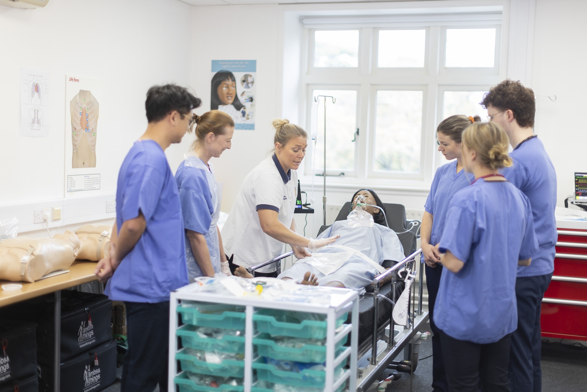 Students gather for a demostration with a physio