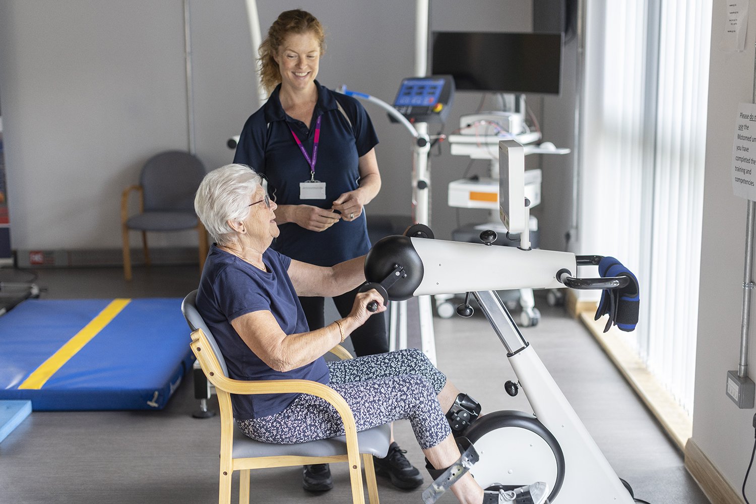 A patient on a exercise bike.