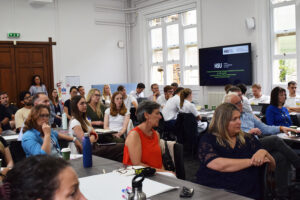Audience following the talk at IMHI