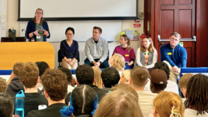 Amanda Weaver (left) leading a graduate panel discussion with HSU alumni, sharing career experiences and advice with final-year students.